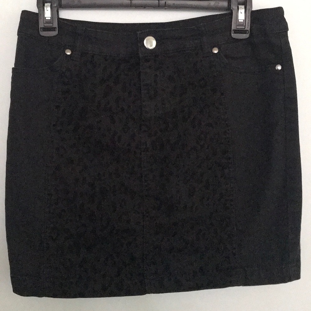 H&M’s mini black leopard skirt with split
